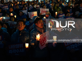 Hundreds of citizens, along with members of the Democratic Party of Korea, gather in front of the National Assembly in Yeouido to participat...