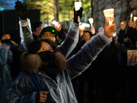 Hundreds of citizens, along with members of the Democratic Party of Korea, gather in front of the National Assembly in Yeouido to participat...