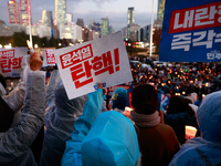 Hundreds of citizens, along with members of the Democratic Party of Korea, gather in front of the National Assembly in Yeouido to participat...