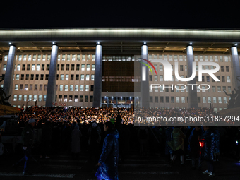 Hundreds of citizens, along with members of the Democratic Party of Korea, gather in front of the National Assembly in Yeouido to participat...