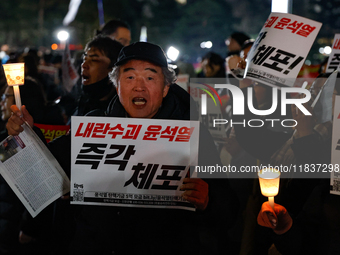 Hundreds of citizens, along with members of the Democratic Party of Korea, gather in front of the National Assembly in Yeouido to participat...