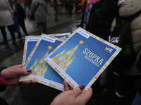 KRAKOW, POLAND - DECEMBER 05:
Official programme for the 82nd Nativity Scene Contest distributed in Krakow's Market Square, on December 5, 2...