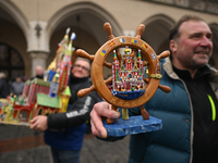 KRAKOW, POLAND - DECEMBER 05:
A contestant presents their handcrafted Nativity Scene at Krakow's Main Square during the 82nd Nativity Scene...