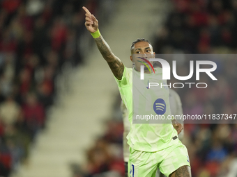 Raphinha right winger of Barcelona and Brazil celebrates after scoring his sides second goal during the La Liga match between RCD Mallorca a...