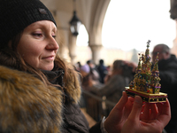 KRAKOW, POLAND - DECEMBER 05:
A contestant presents their handcrafted Nativity Scene at Krakow's Main Square during the 82nd Nativity Scene...