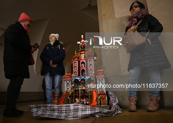 KRAKOW, POLAND - DECEMBER 05:
Contestants present their handcrafted Nativity Scene at Krakow's Main Square during the 82nd Nativity Scene Co...