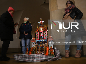 KRAKOW, POLAND - DECEMBER 05:
Contestants present their handcrafted Nativity Scene at Krakow's Main Square during the 82nd Nativity Scene Co...