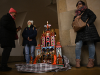 KRAKOW, POLAND - DECEMBER 05:
Contestants present their handcrafted Nativity Scene at Krakow's Main Square during the 82nd Nativity Scene Co...