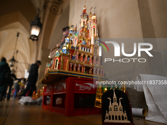 KRAKOW, POLAND - DECEMBER 05:
Contestants present their handcrafted Nativity Scene at Krakow's Main Square during the 82nd Nativity Scene Co...