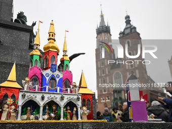 KRAKOW, POLAND - DECEMBER 05:
Contestants present their handcrafted Nativity Scenes at Krakow's Main Square during the 82nd Nativity Scene C...