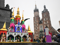 KRAKOW, POLAND - DECEMBER 05:
Contestants present their handcrafted Nativity Scenes at Krakow's Main Square during the 82nd Nativity Scene C...