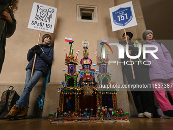 KRAKOW, POLAND - DECEMBER 05:
Contestants present their handcrafted Nativity Scene at Krakow's Main Square during the 82nd Nativity Scene Co...