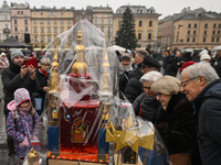 KRAKOW, POLAND - DECEMBER 05:
A contestant presents their handcrafted Nativity Scene at Krakow's Main Square during the 82nd Nativity Scene...