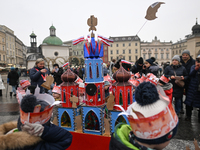 KRAKOW, POLAND - DECEMBER 05:
A group of young contestants from kindergarten number 95 presents their handcrafted Nativity Scene at Krakow's...