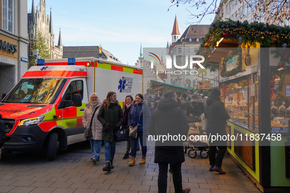 An ambulance provides rescue service at the Christmas market on Marienplatz in Munich, Germany, on December 5, 2024. 