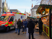 An ambulance provides rescue service at the Christmas market on Marienplatz in Munich, Germany, on December 5, 2024. (