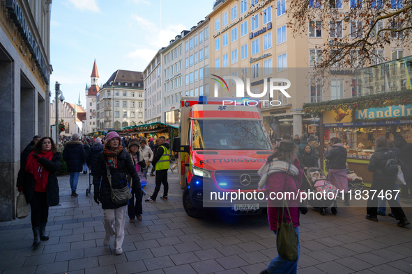 An ambulance provides rescue service at the Christmas market on Marienplatz in Munich, Germany, on December 5, 2024. 