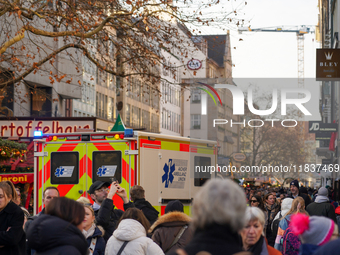 An ambulance provides rescue service at the Christmas market on Marienplatz in Munich, Germany, on December 5, 2024. (