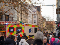 An ambulance provides rescue service at the Christmas market on Marienplatz in Munich, Germany, on December 5, 2024. (