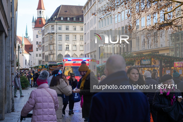 An ambulance provides rescue service at the Christmas market on Marienplatz in Munich, Germany, on December 5, 2024. 