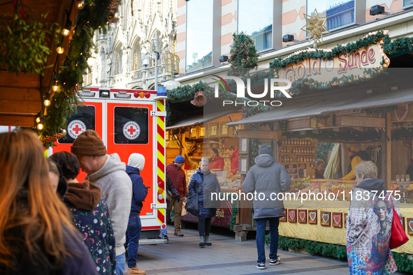 An ambulance provides rescue service at the Christmas market on Marienplatz in Munich, Germany, on December 5, 2024. 