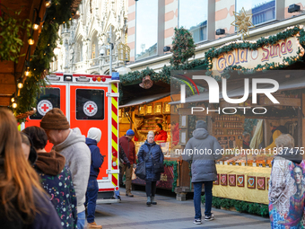 An ambulance provides rescue service at the Christmas market on Marienplatz in Munich, Germany, on December 5, 2024. (