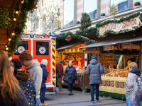 An ambulance provides rescue service at the Christmas market on Marienplatz in Munich, Germany, on December 5, 2024. (