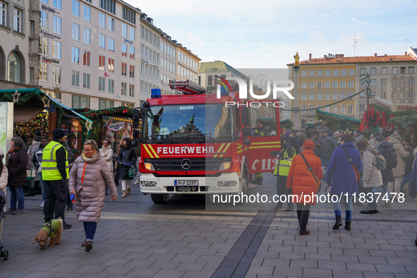 A fire engine is at the Christmas market on Marienplatz in Munich, Germany, on December 5, 2024. 