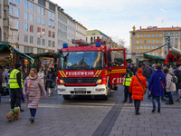 A fire engine is at the Christmas market on Marienplatz in Munich, Germany, on December 5, 2024. (