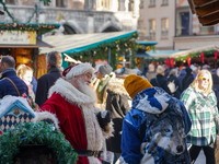 Santa Claus is at the Christmas market on Marienplatz in Munich, Germany, on December 5, 2024. (