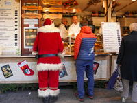 People are at the Christmas market on Marienplatz in Munich, Germany, on December 5, 2024. (