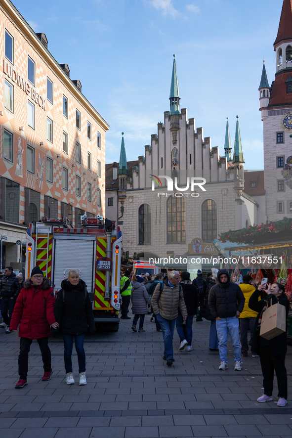 People are at the Christmas market on Marienplatz in Munich, Germany, on December 5, 2024. 