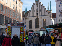 People are at the Christmas market on Marienplatz in Munich, Germany, on December 5, 2024. (