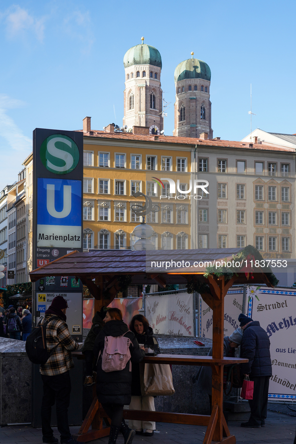 People are at the Christmas market on Marienplatz in Munich, Germany, on December 5, 2024. 