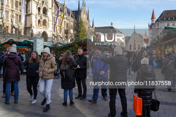 People are at the Christmas market on Marienplatz in Munich, Germany, on December 5, 2024. 