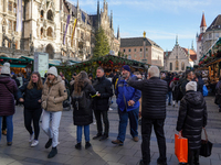 People are at the Christmas market on Marienplatz in Munich, Germany, on December 5, 2024. (