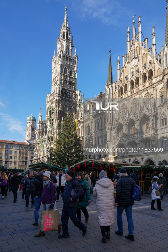 People are at the Christmas market on Marienplatz in Munich, Germany, on December 5, 2024. 