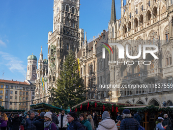 People are at the Christmas market on Marienplatz in Munich, Germany, on December 5, 2024. (