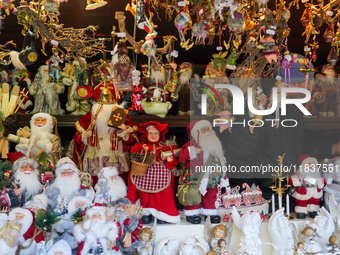 A sales stand with Santa Claus figures is at the Christmas market on Marienplatz in Munich, Germany, on December 5, 2024. (