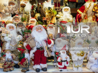 A sales stand with Santa Claus figures is at the Christmas market on Marienplatz in Munich, Germany, on December 5, 2024. (