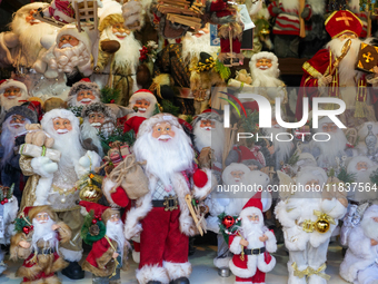 A sales stand with Santa Claus figures is at the Christmas market on Marienplatz in Munich, Germany, on December 5, 2024. (