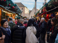 People are at the Christmas market on Marienplatz in Munich, Germany, on December 5, 2024. (