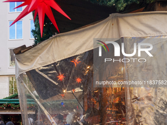 People are at the Christmas market on Marienplatz in Munich, Germany, on December 5, 2024. (