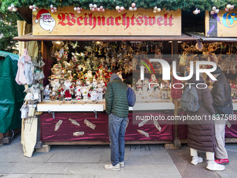 A sales stand with Santa Claus figures is at the Christmas market on Marienplatz in Munich, Germany, on December 5, 2024. (