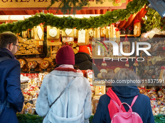 People are at the Christmas market on Marienplatz in Munich, Germany, on December 5, 2024. (