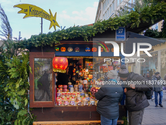 People are at the Christmas market on Marienplatz in Munich, Germany, on December 5, 2024. (