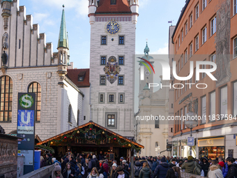 People are at the Christmas market on Marienplatz in Munich, Germany, on December 5, 2024. (