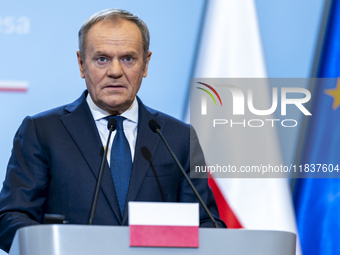 Prime Minister Donald Tusk speaking to the press after a meeting with the President of the European Parliament Roberta Metsola and the Confe...