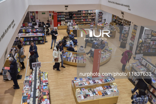 A glimpse inside an Italian bookstore in Bari, Italy, on December 2, 2024, shows a place where the passion for books and culture meets. Shel...