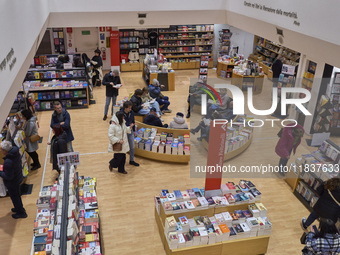 A glimpse inside an Italian bookstore in Bari, Italy, on December 2, 2024, shows a place where the passion for books and culture meets. Shel...